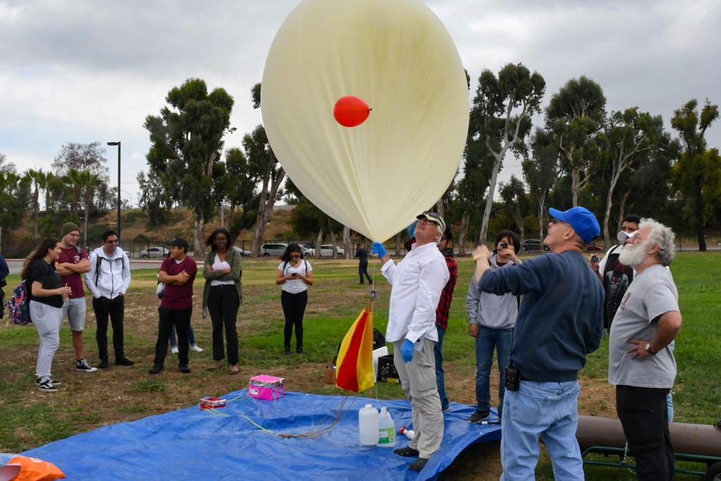 Students with a balloon 