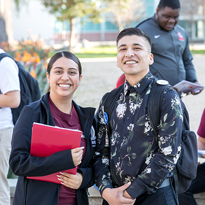 Image of two students smiling