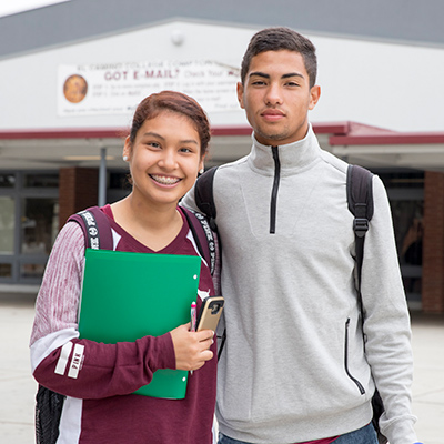 Image of a female and male student standing together